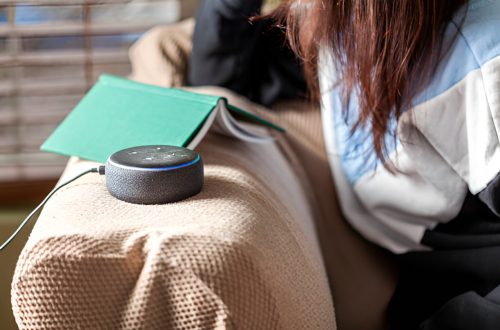 amazon echo dot next to a book